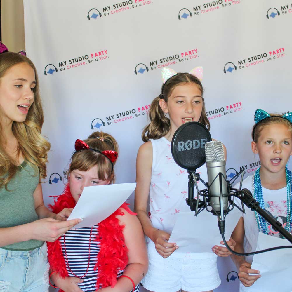Kid singing on the red carpet at a My Studio Party Pop Star Party