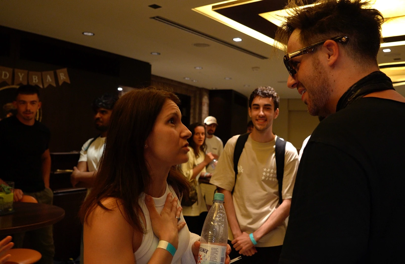 Julien speaking directly with an event attendee
