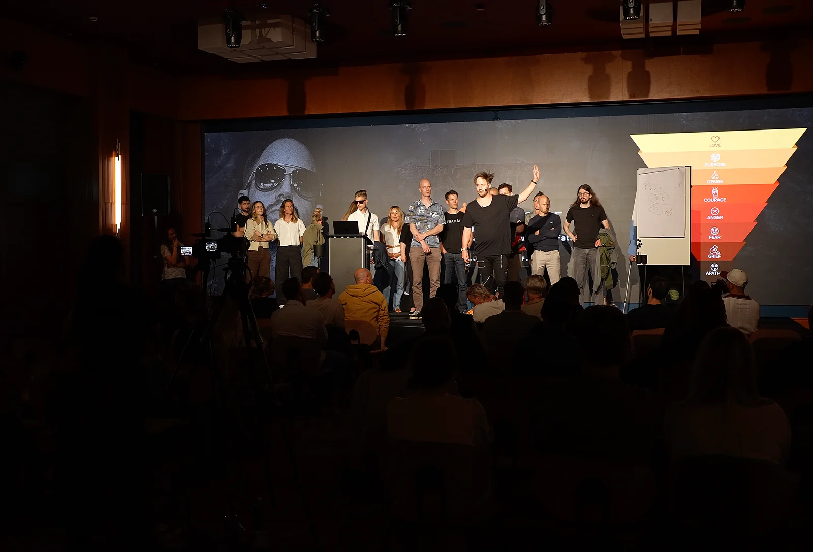 Julien guiding a group of participants on stage at the JulienHimself Tour