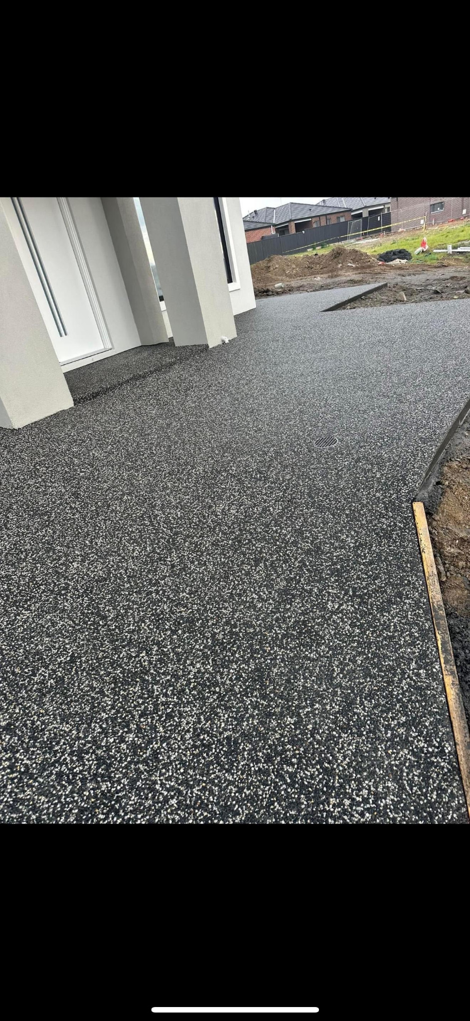 Textured concrete surface around a home exterior
