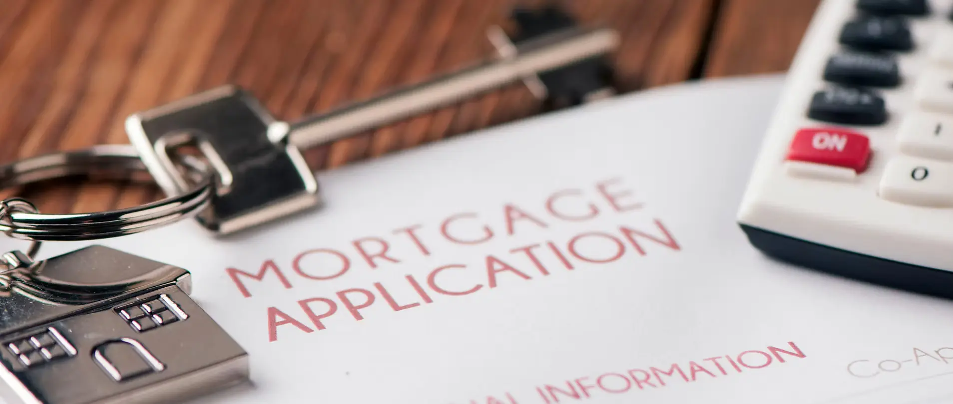 A first-time homebuyer reviewing pre-approval paperwork