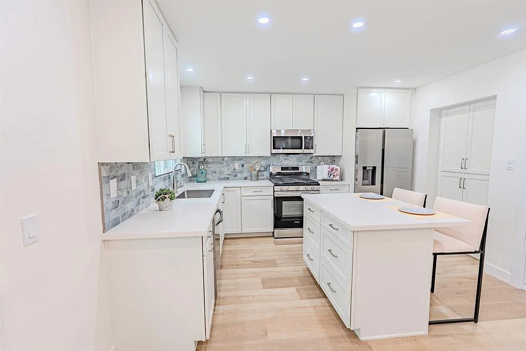 Glass-enclosed sunroom at 1250 Connecticut St providing a bright bonus living space
