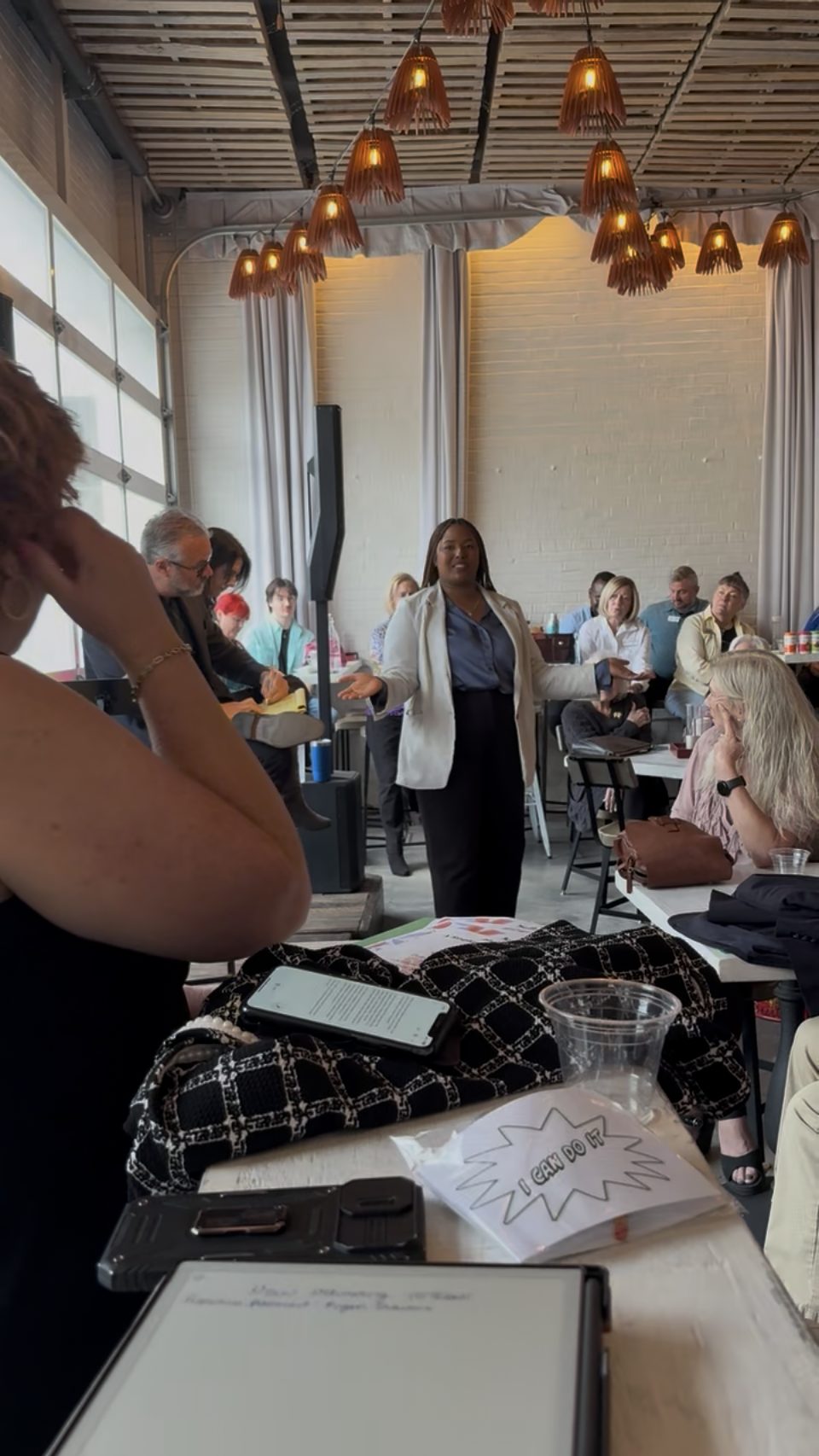 Tori speaking at a live training event