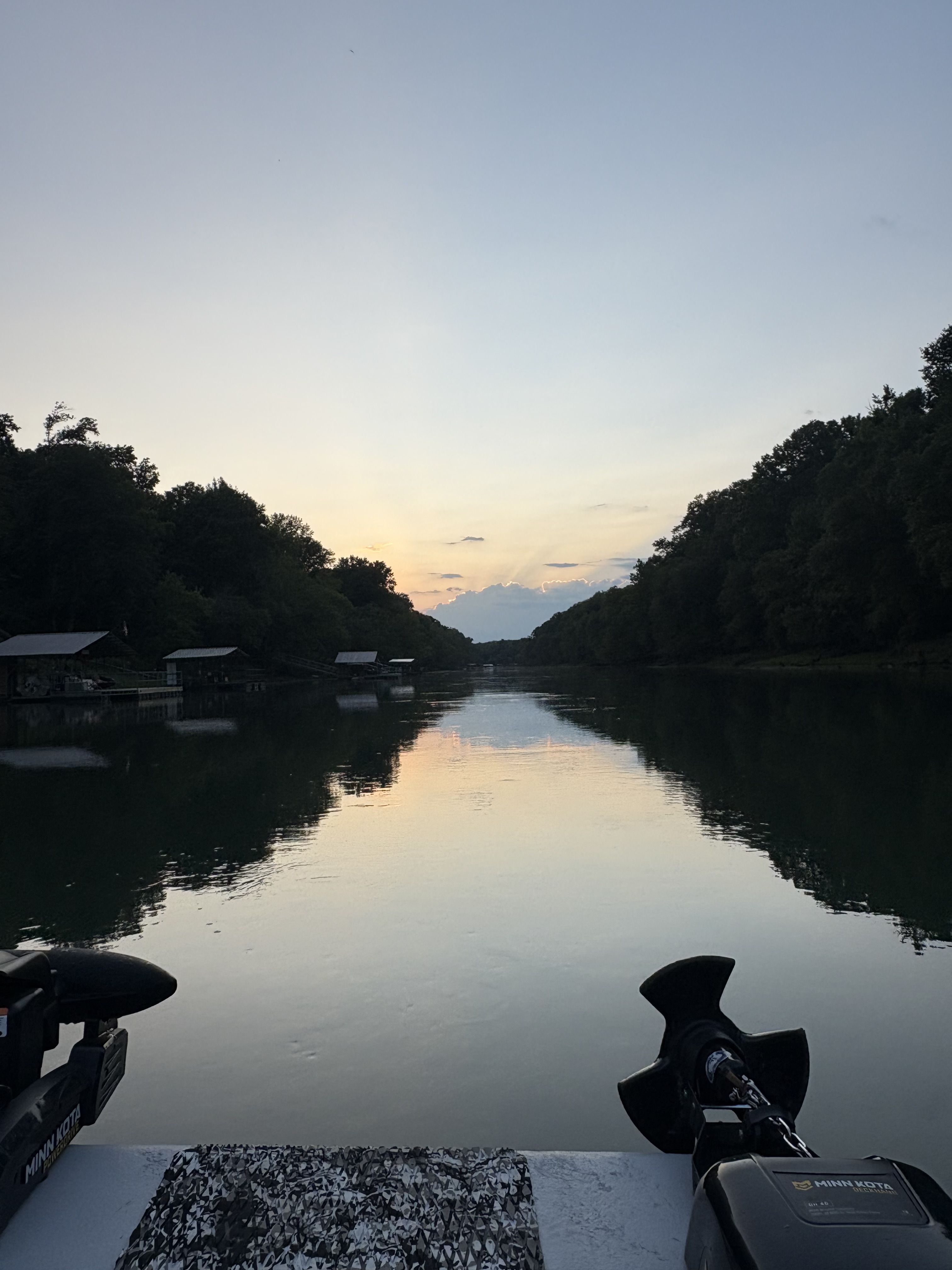 Little Red River in spring with green banks and clear water perfect for trout fishing