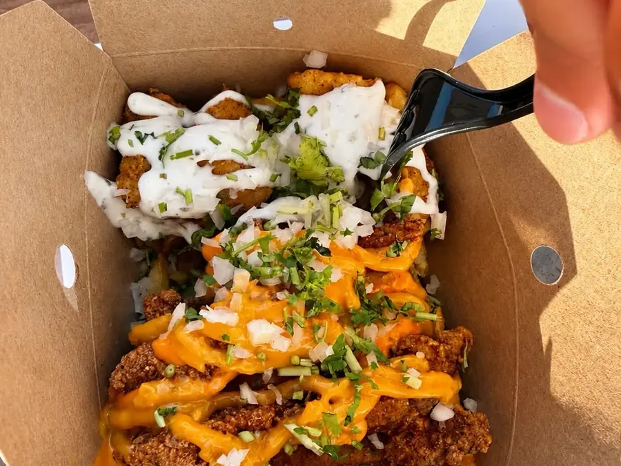 Chicken n' Chipz box with fried chicken, sauces and herbs at CHIPZ London