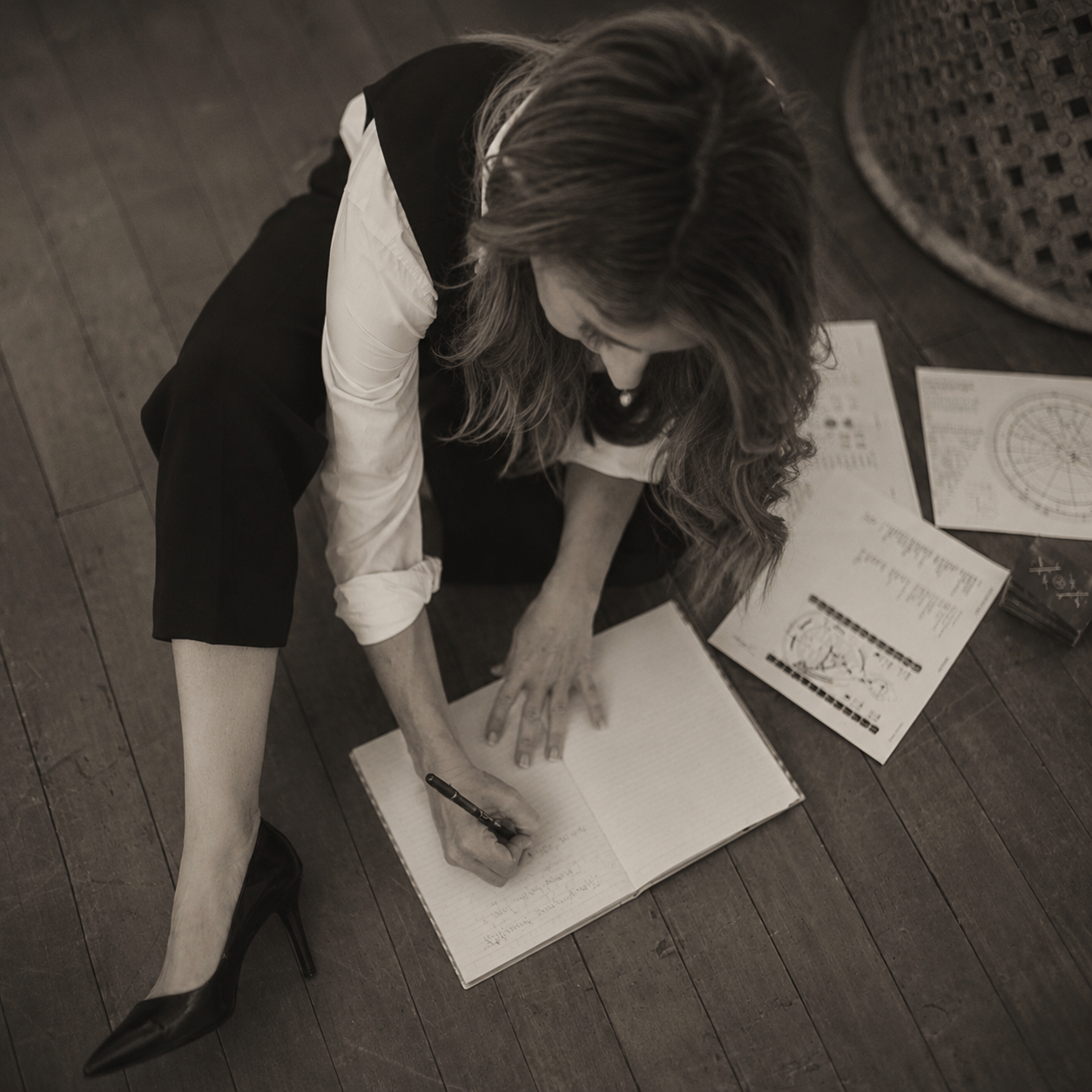 Human Design chart on desk with notebook