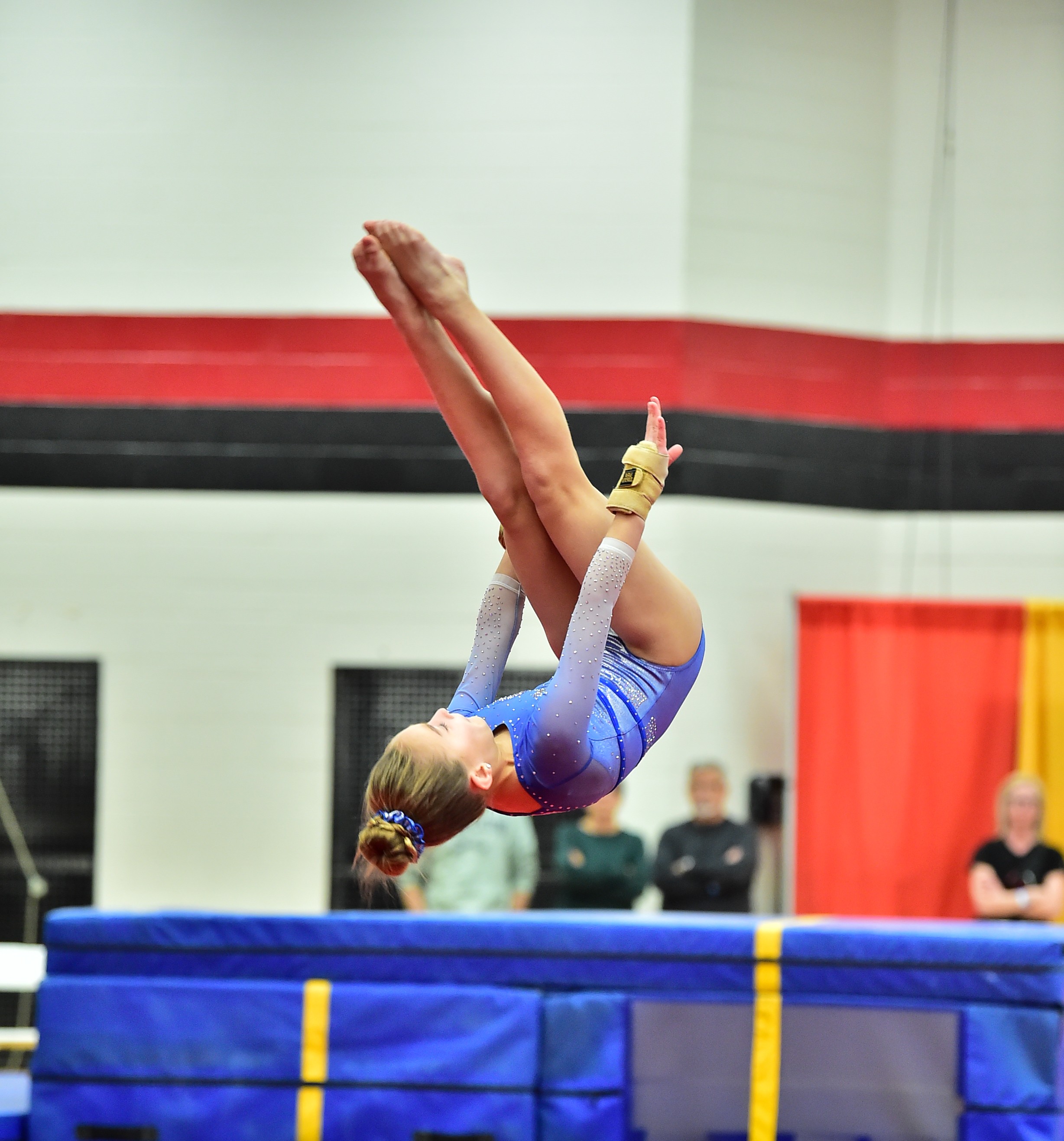 Teenager doing back handspring