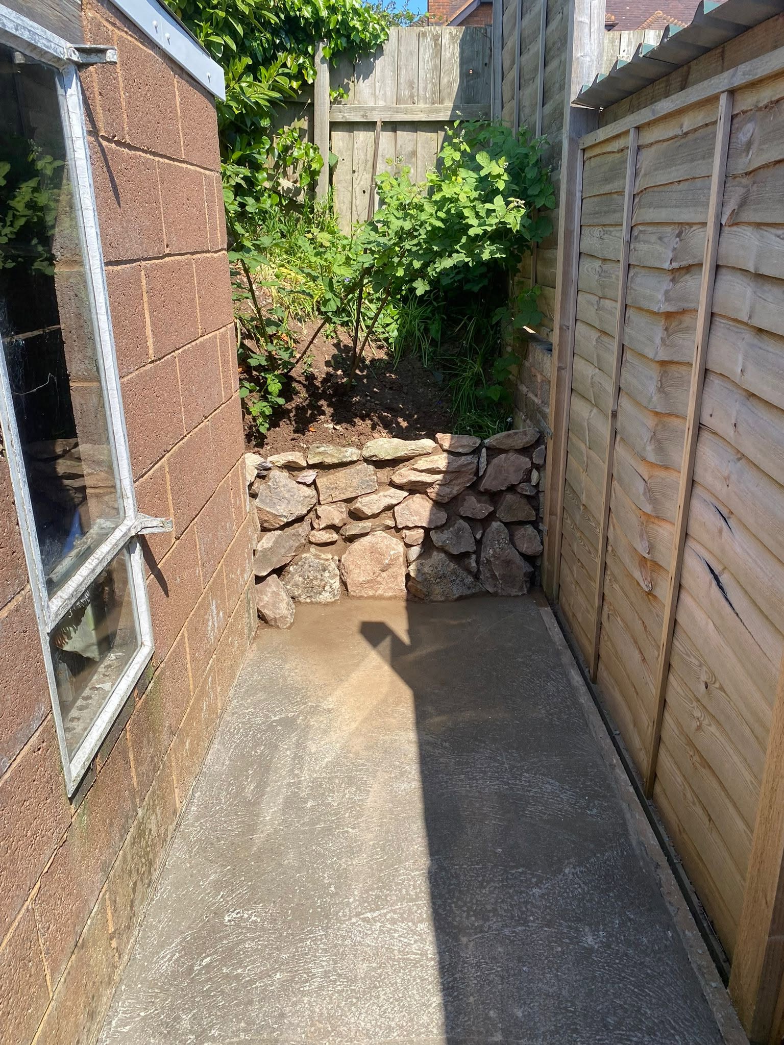 Decorative stone garden feature laid by J&J Contractors in South Devon