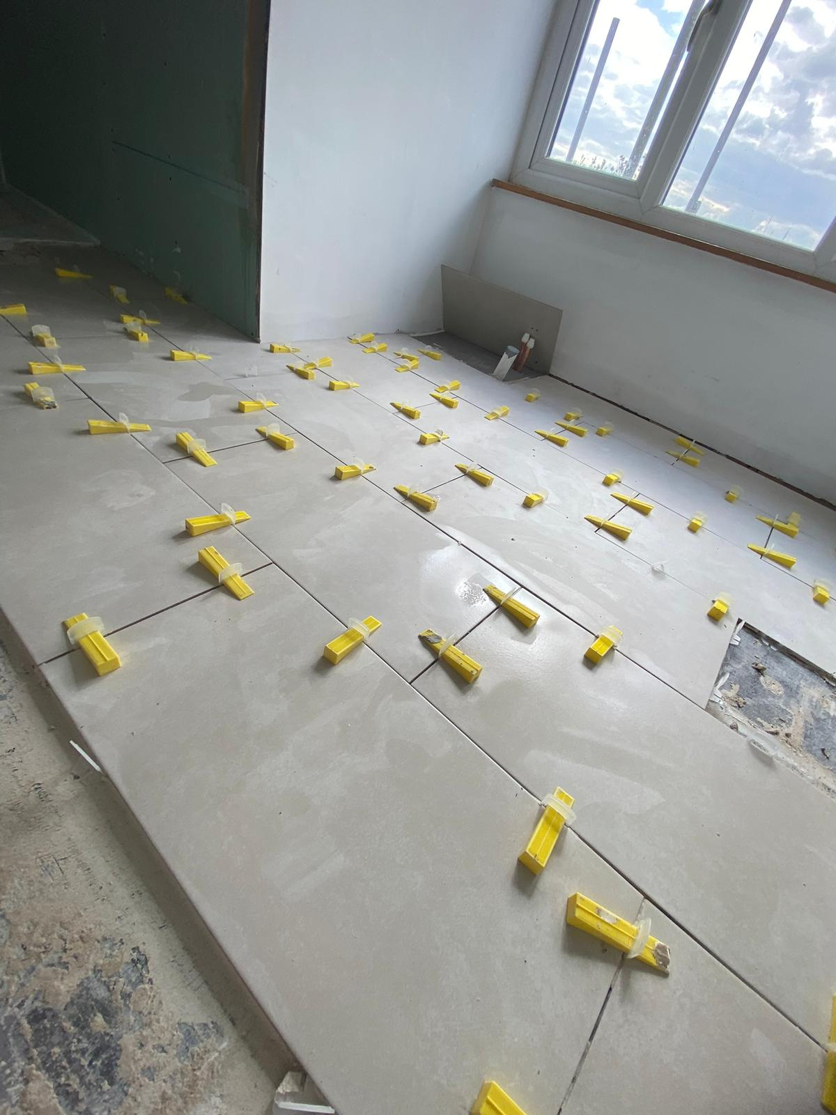 Cob cottage sympathetic plastering and landscaping in Crediton