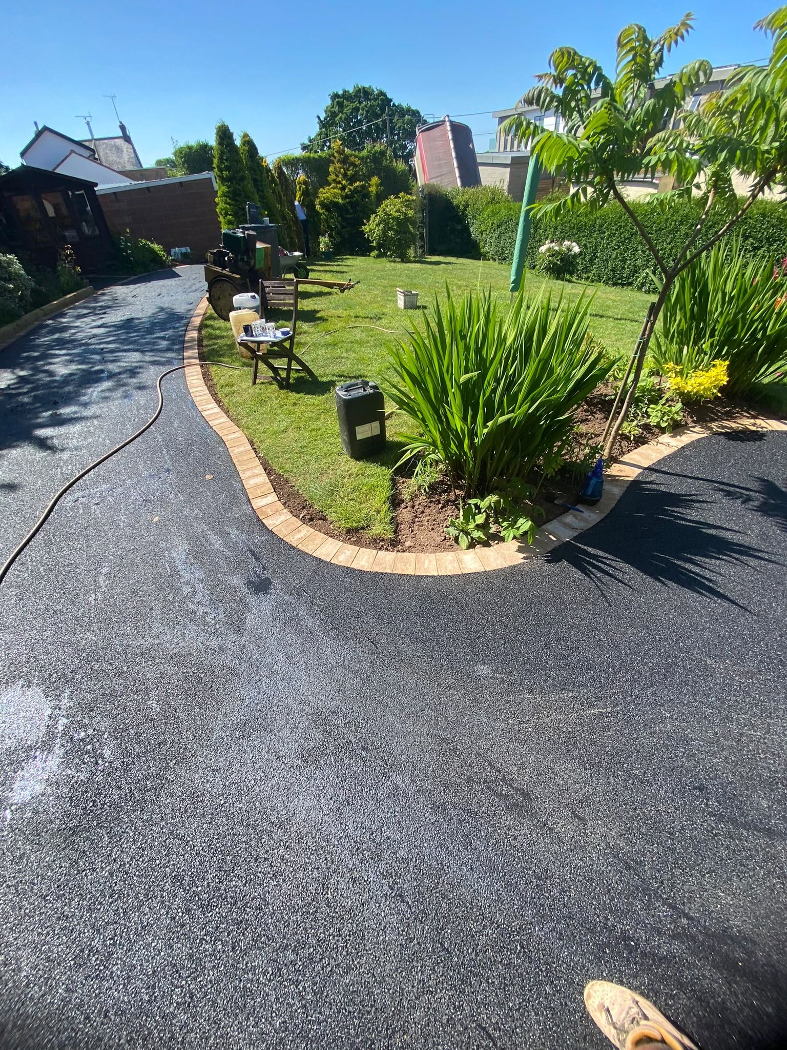 Driveways & Surfacing — New driveways across Exeter and South Devon in resin bound, block paving, gravel and concrete, built on a solid base and backed by a 10-year guarantee