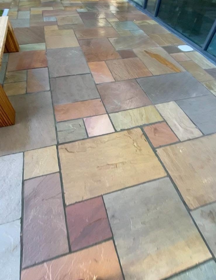 Multi-level patio and lawn transformation in Paignton