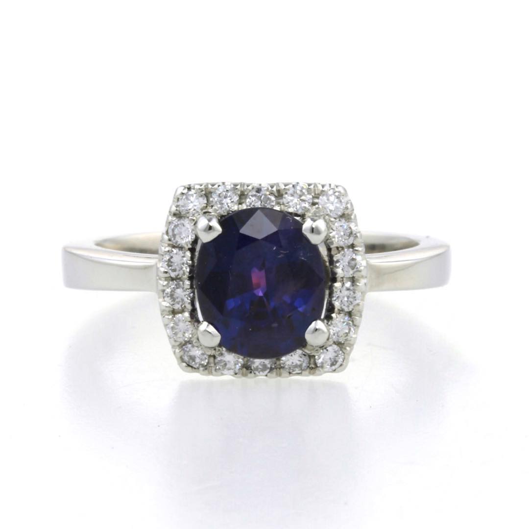 purple sapphire and diamond halo engagement ring