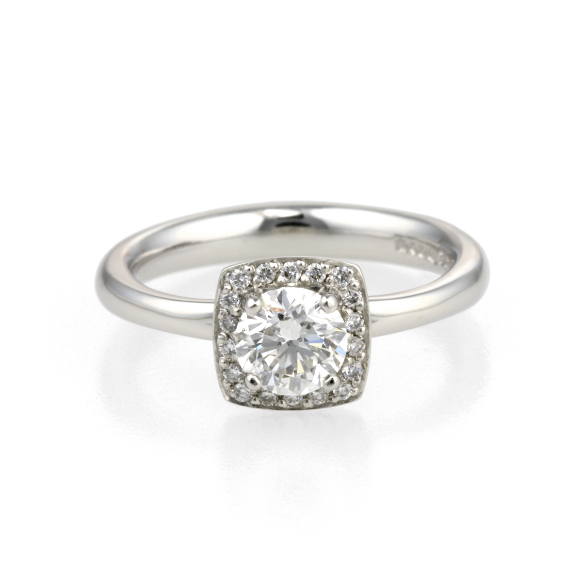 platinum and diamond halo engagement ring