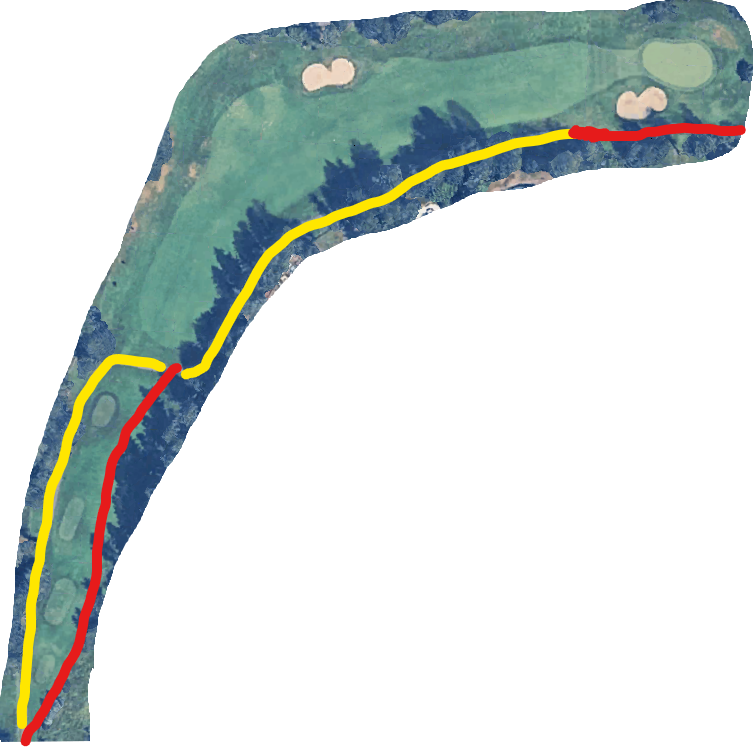 Completed smooth cart path winding through a tree-lined fairway in fall