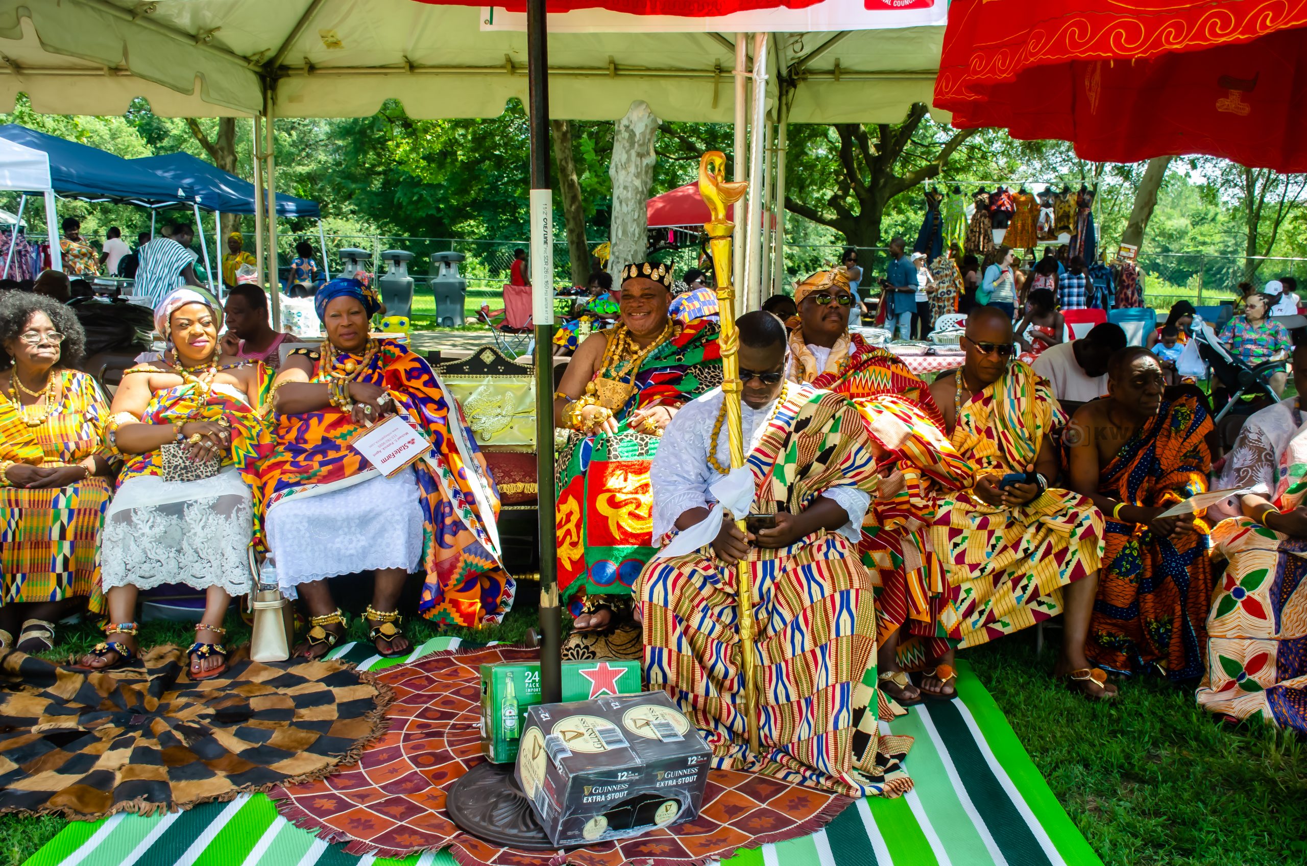 Traditional Ghanaian Kente cloth woven on narrow horizontal looms by Ashanti and Ewe artisans, featuring symbolic geometric patterns and kaleidoscopic colors like gold for wealth and red for passion. Traditional Ghanaian Kente cloth woven on narrow horizontal looms by Ashanti and Ewe artisans, featuring symbolic geometric patterns and kaleidoscopic colors like gold for wealth and red for passion.