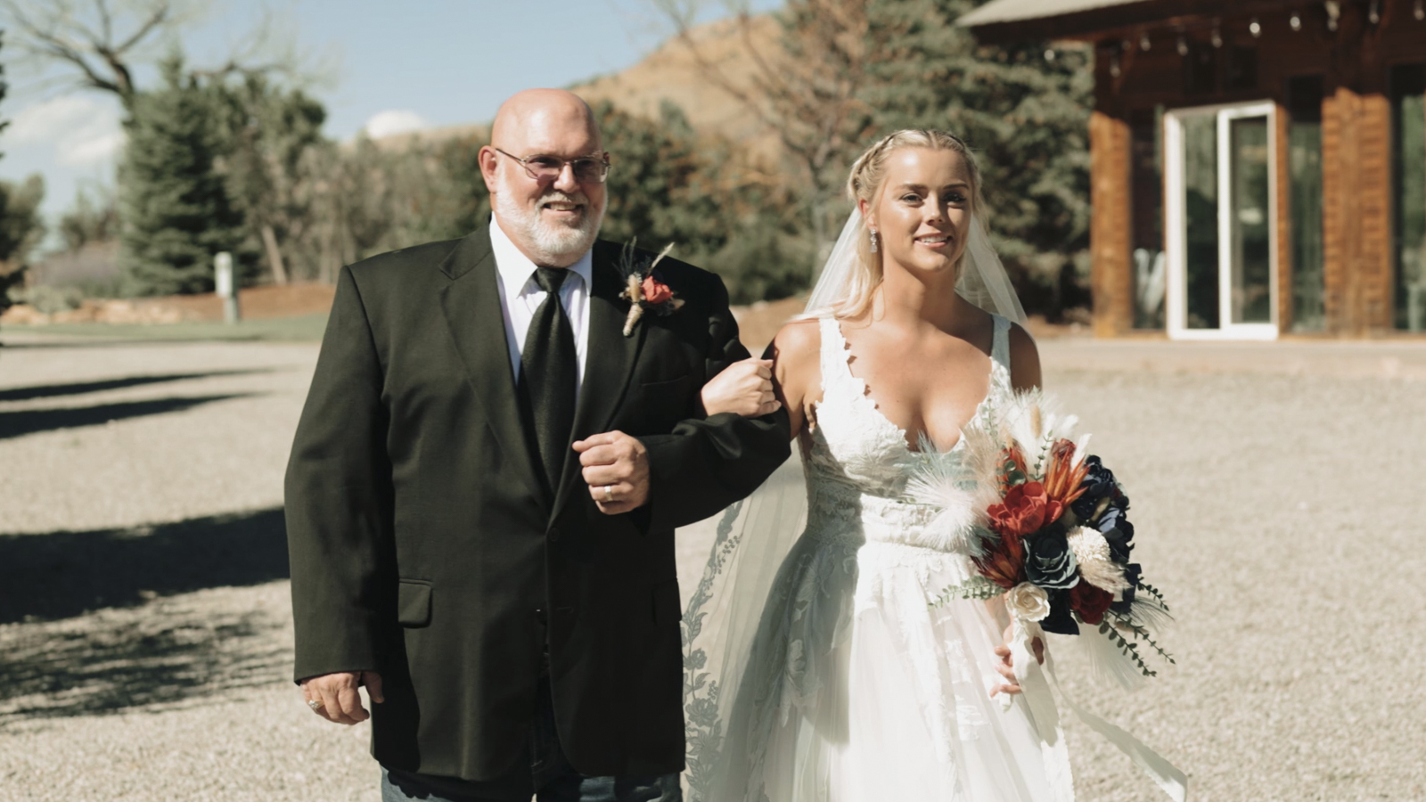 A bride walking down the aisle with her father