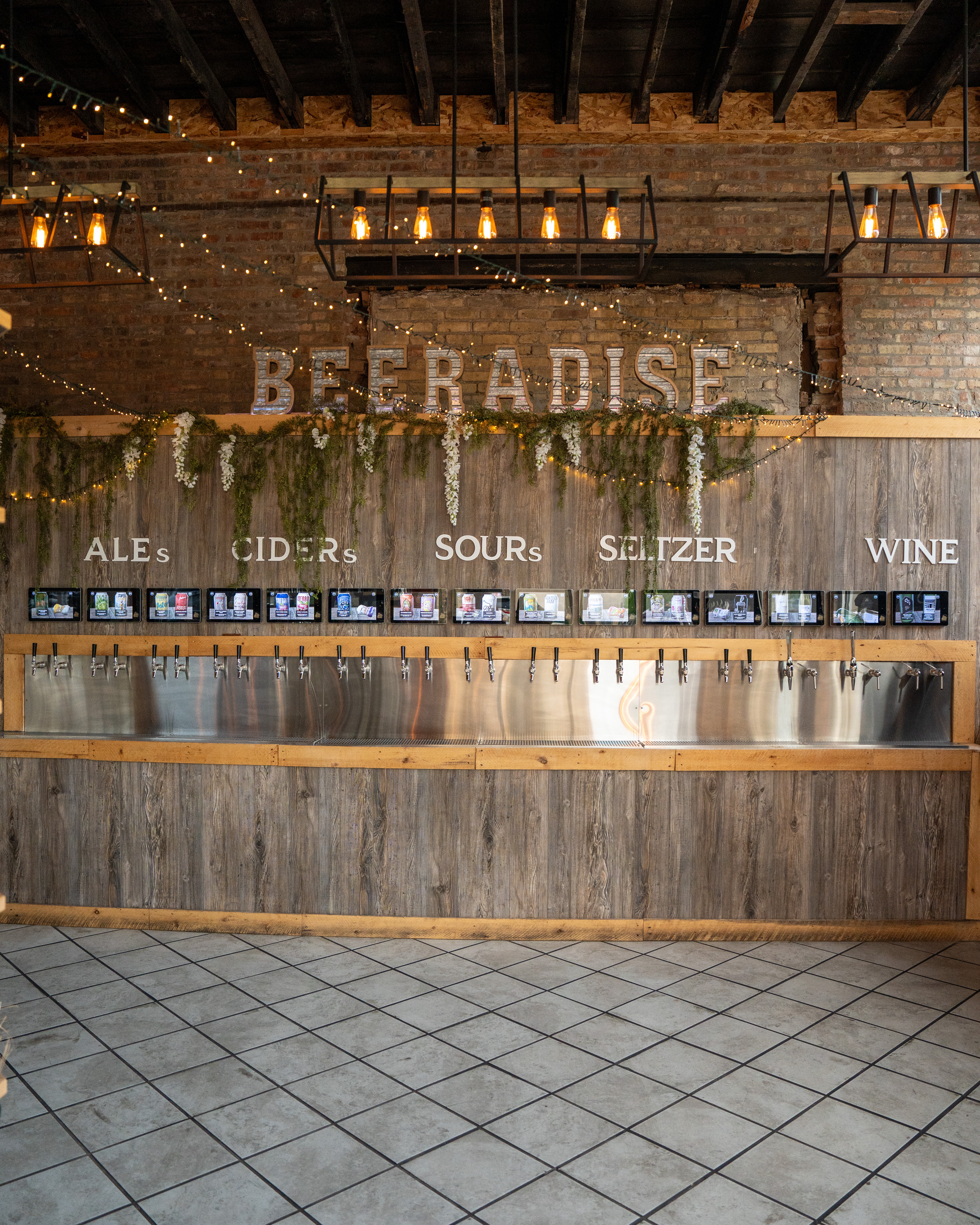 Beeradise 50-tap self-pour beer wall at Hold My Beer Kenosha