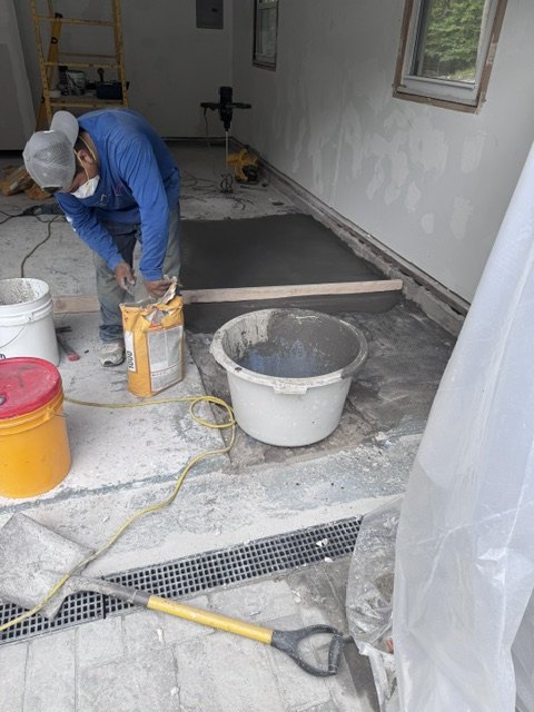 Concrete repair before moisture barrier epoxy primer by Forward 18 Coatings & Flooring