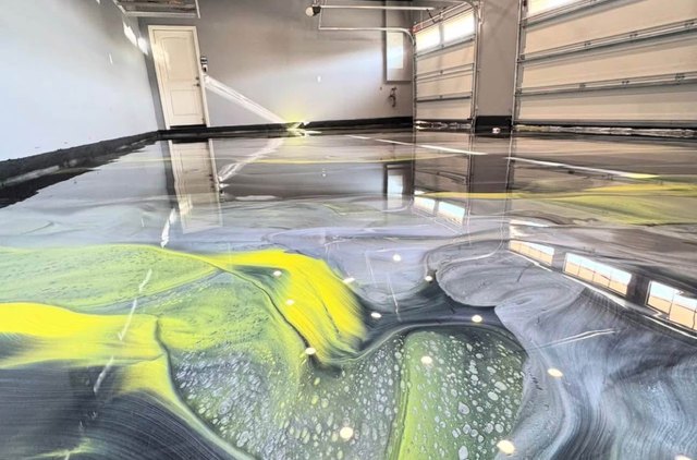 Green & gold metallic garage epoxy floor by Forward 18 Coatings & Flooring