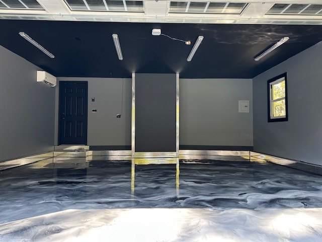 Blue & White Metallic Garage epoxy floor by Forward 18 Coatings & Flooring