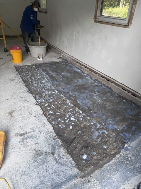 Removing an old failing floor coating from concrete by Forward 18 Coatings & Flooring