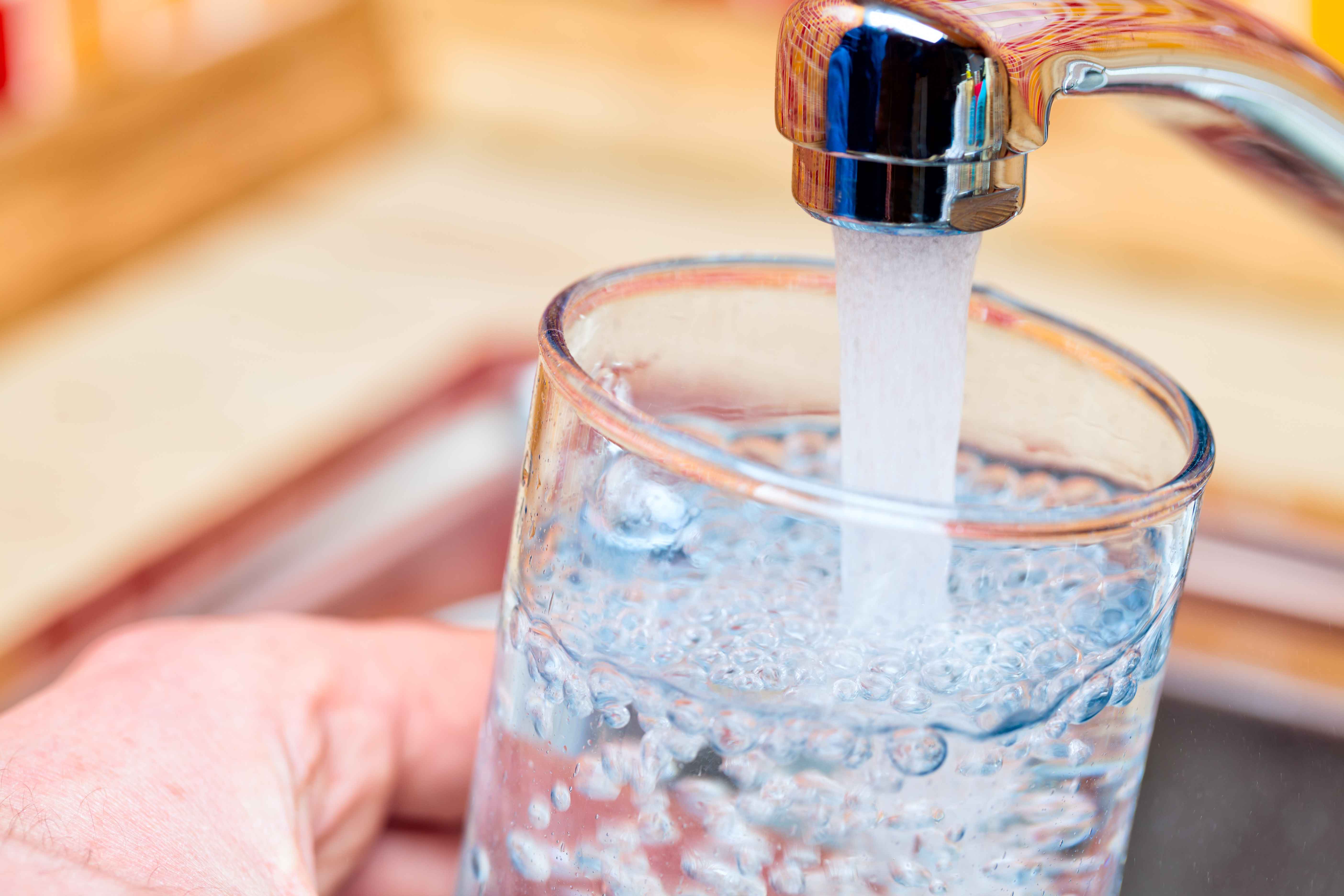 Filling a clean glass of water