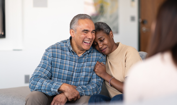 Happy older couple discussing tiny home ADU options for multigenerational living in Connecticut