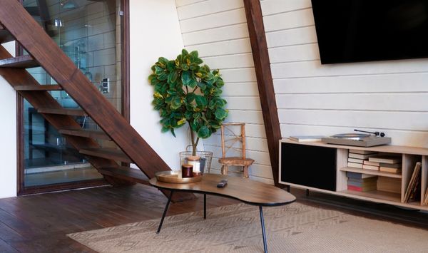 Cozy Connecticut ADU living room with wood floors and compact interior design Cozy Connecticut ADU living room with wood floors and compact interior design
