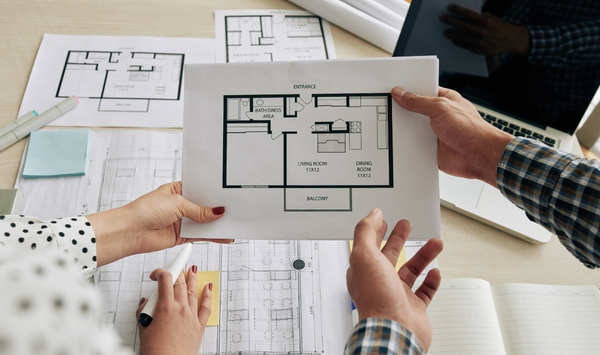Homeowners reviewing ADU floor plans during the design and feasibility stage in Connecticut