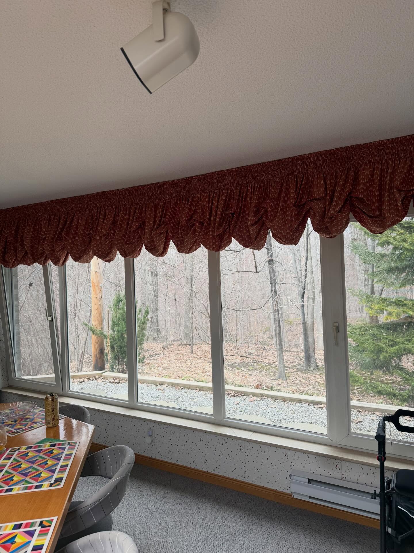 Finished clear security film on large ground-floor windows
