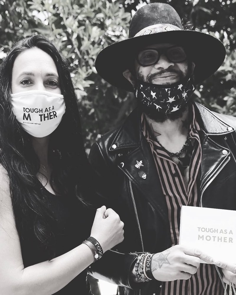 Guns N' Roses drummer Frank Ferrer with founder Jennifer Cervantes