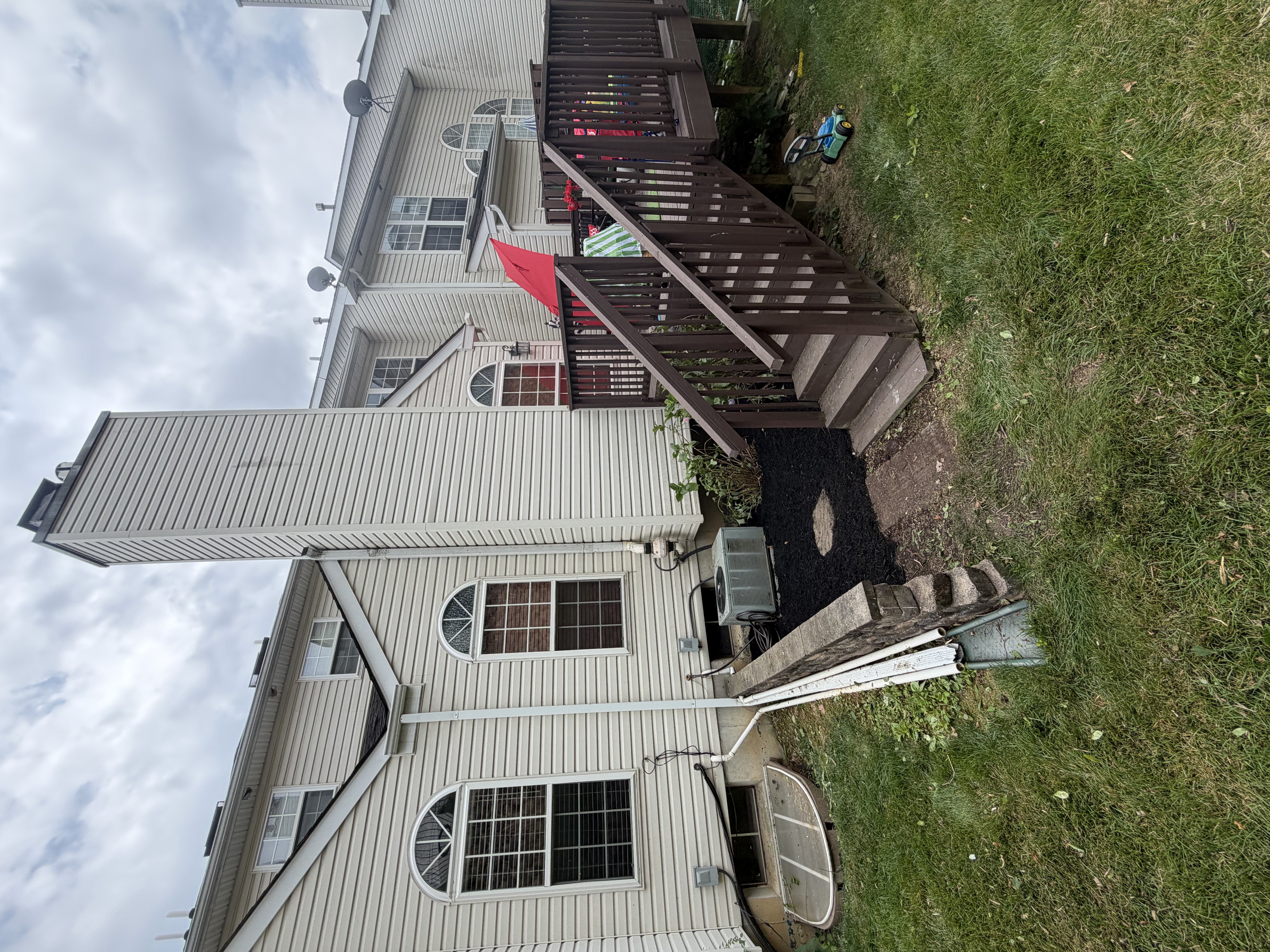 Soft wash roof cleaning on a residential home in Tippah County, MS