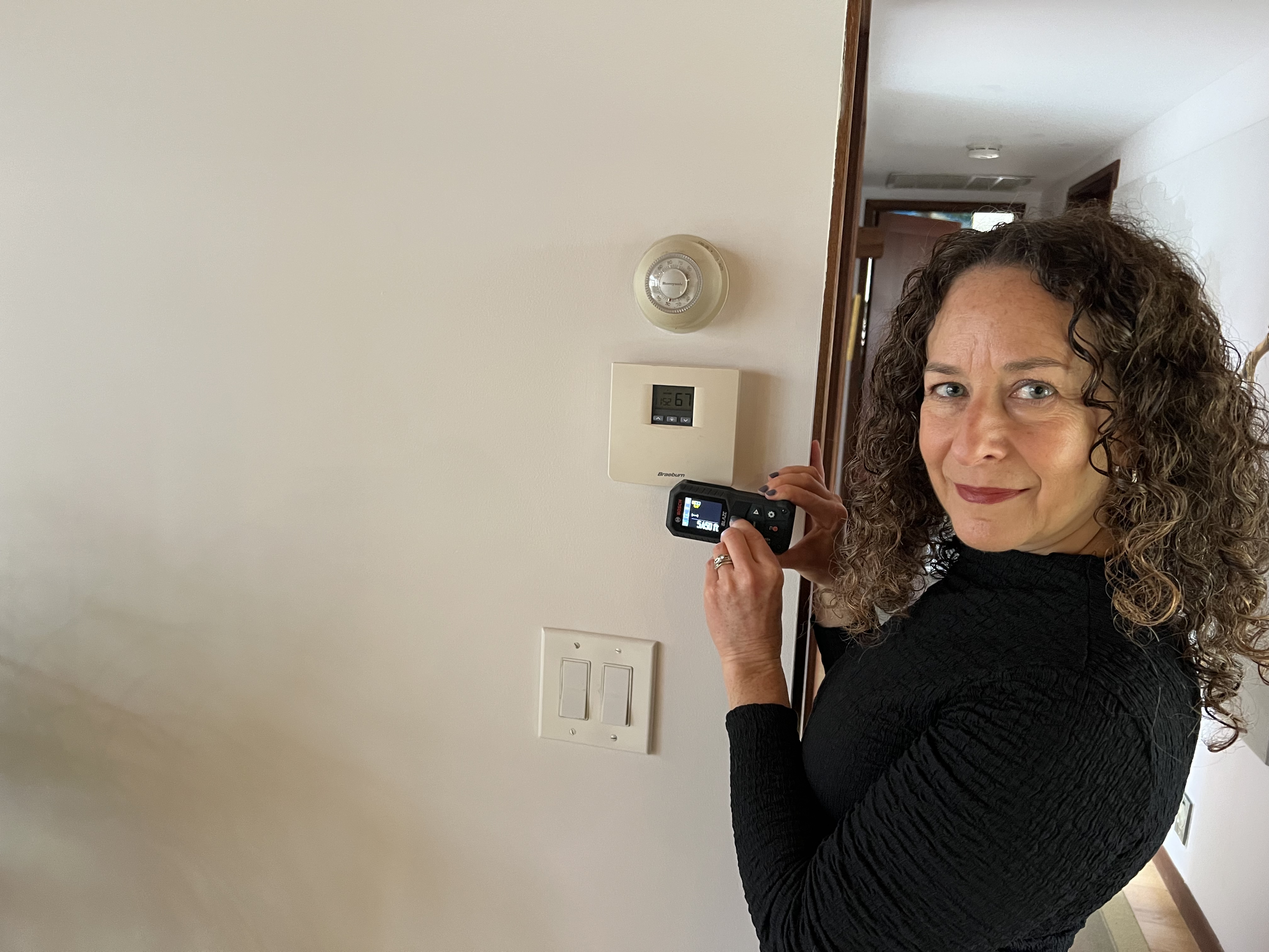 Jodi holding a tablet