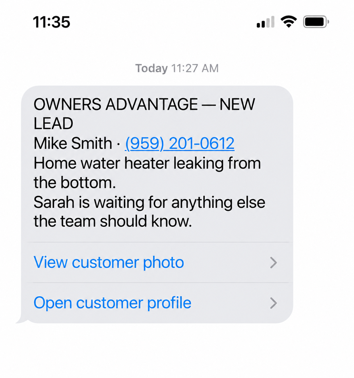 Example Owners Advantage text alert showing a new lead summary and buttons to view the customer photo and profile