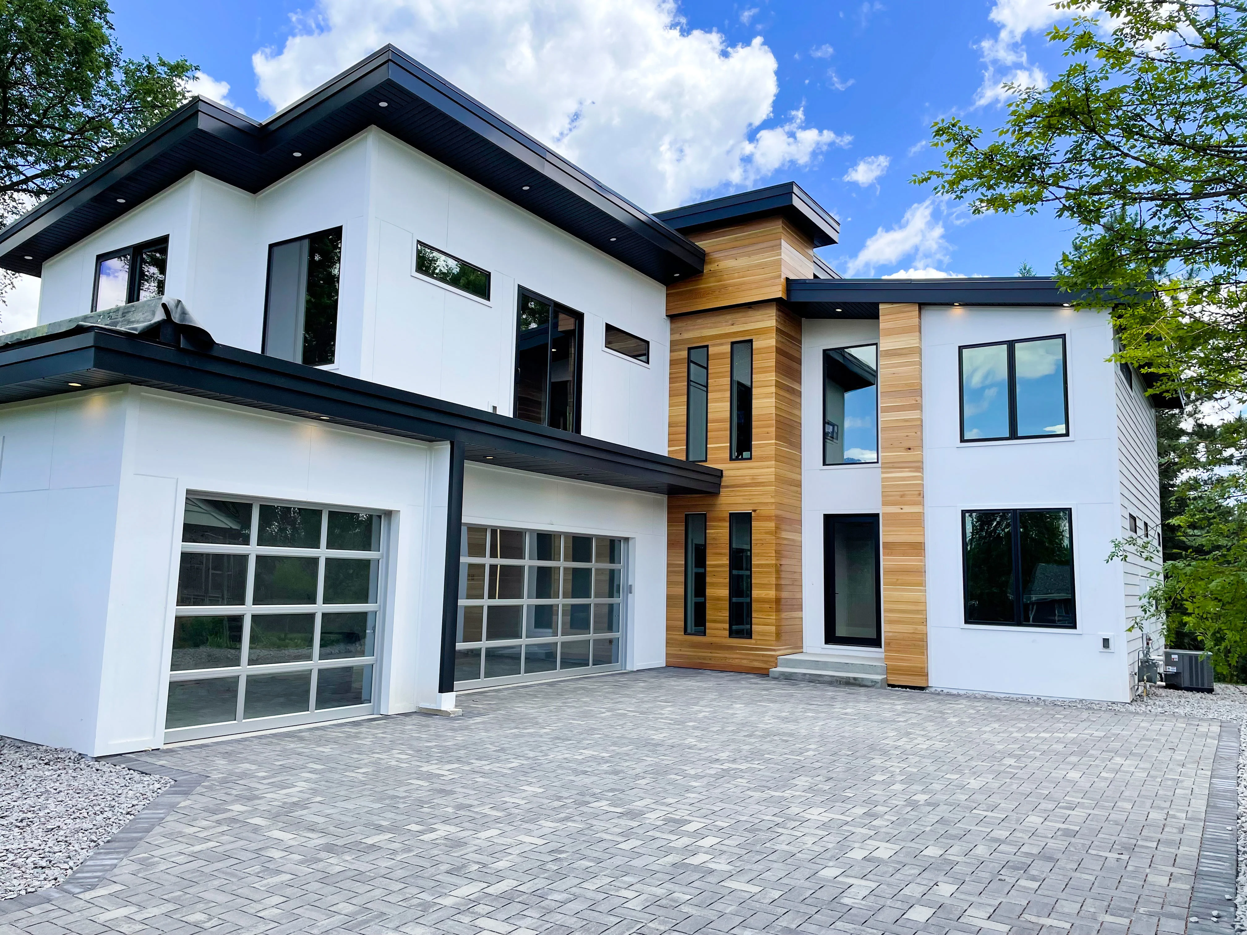 modern residential garage door installation on contemporary home exterior