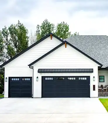 double garage door installation on residential house exterior
