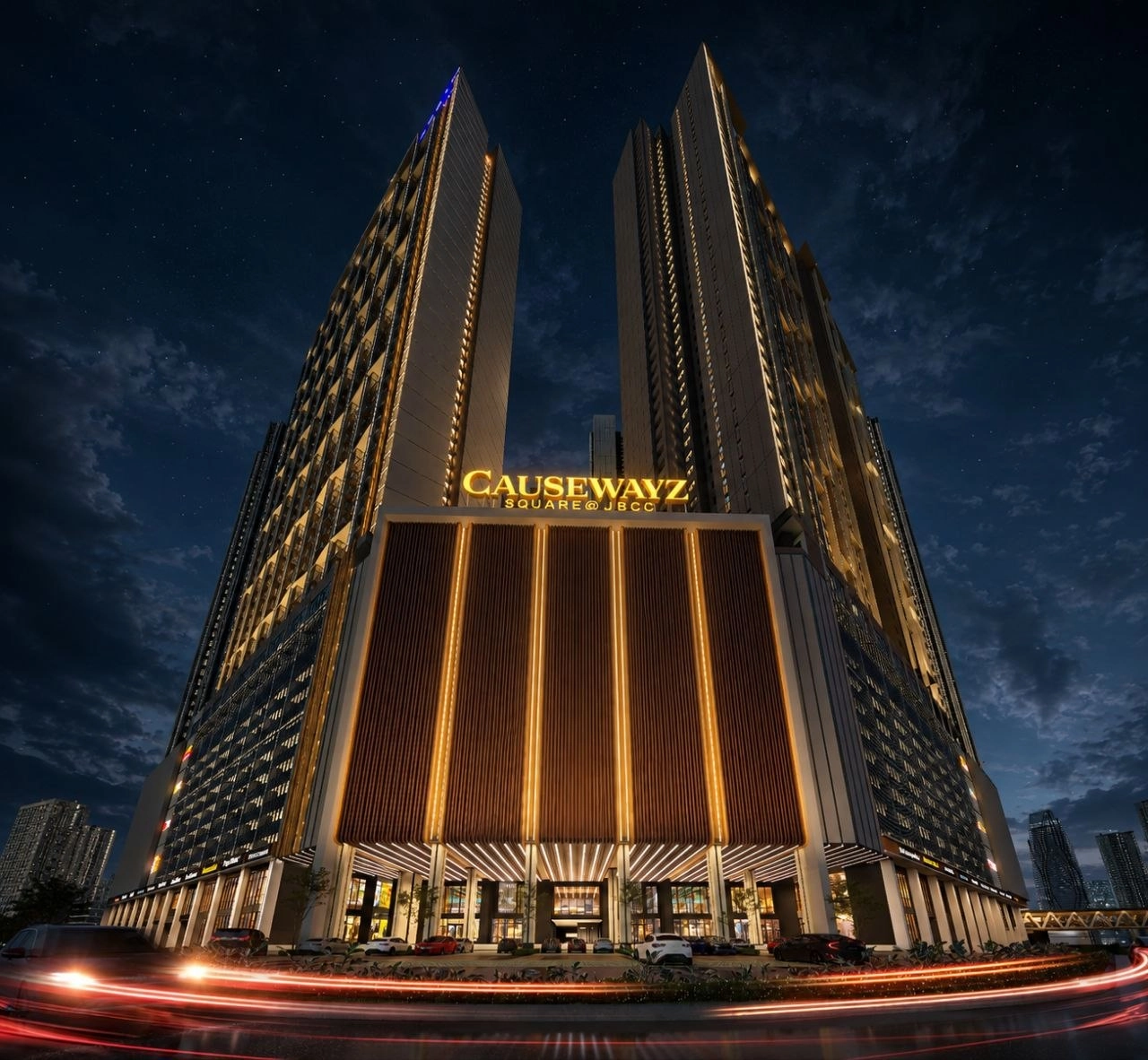 Causewayz Square @ JBCC at night, twin towers with the lit signage above the retail podium