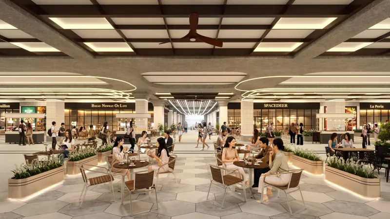 Café plaza in the retail podium with dining tables and shopfronts