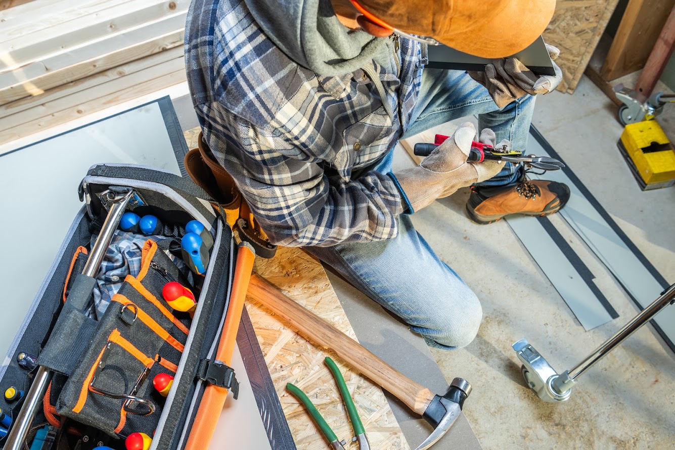 Tradesperson completing detailed interior repair work
