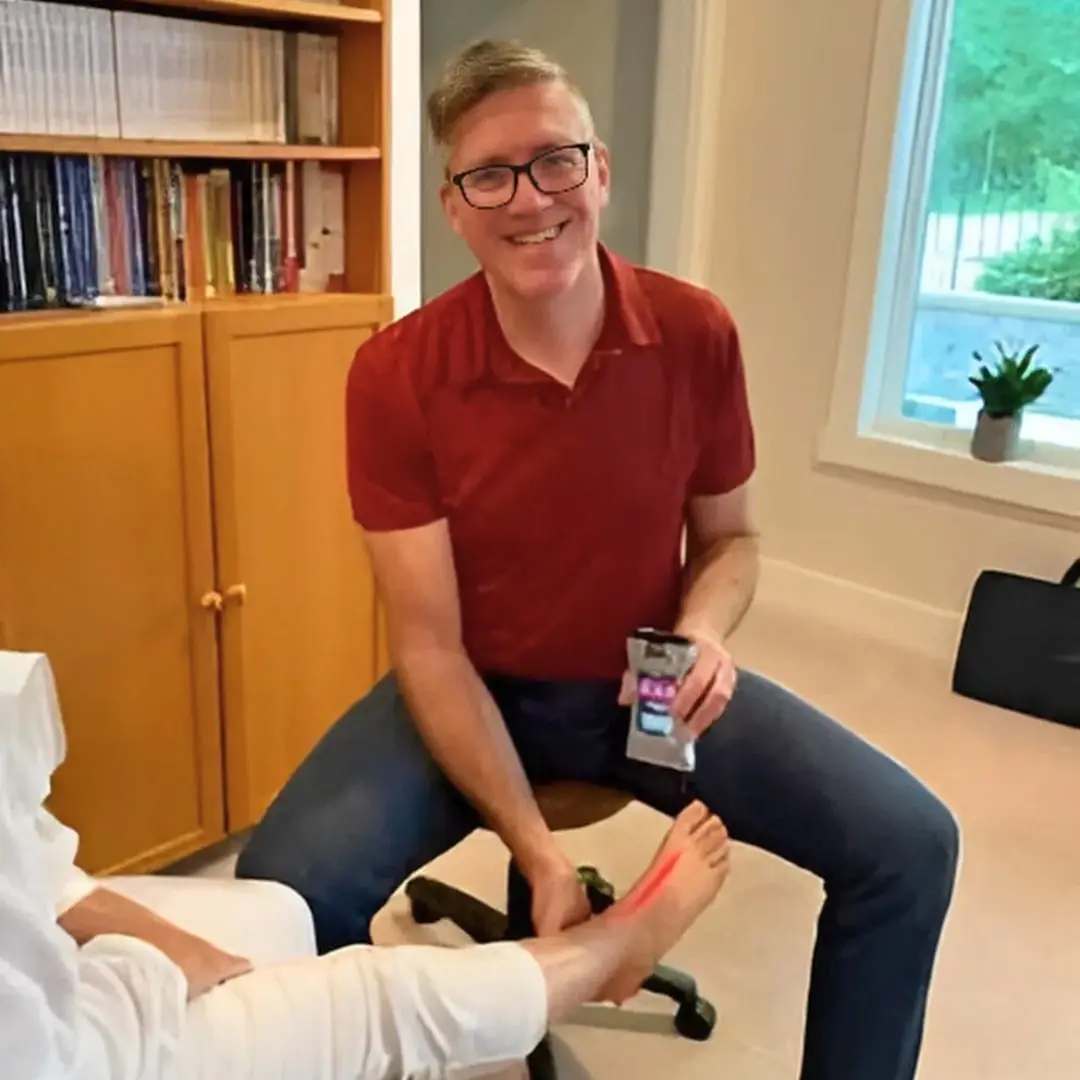 Dr. Bruce Phillips treating patient