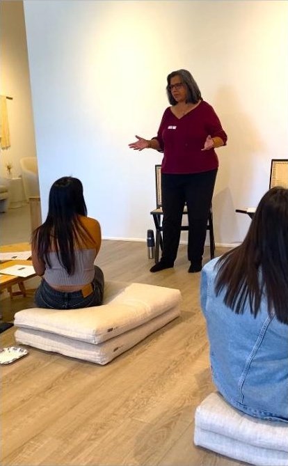 Julia leading a small seated workshop
