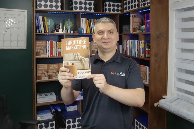 Ahmet Yavuz with the Furniture Marketing book