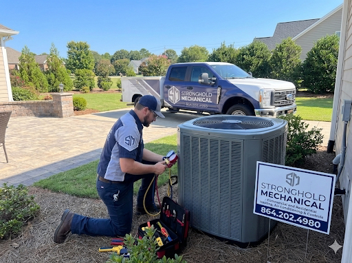 Stronghold Mechanical HVAC technicians at work on a commercial system in Upstate South Carolina