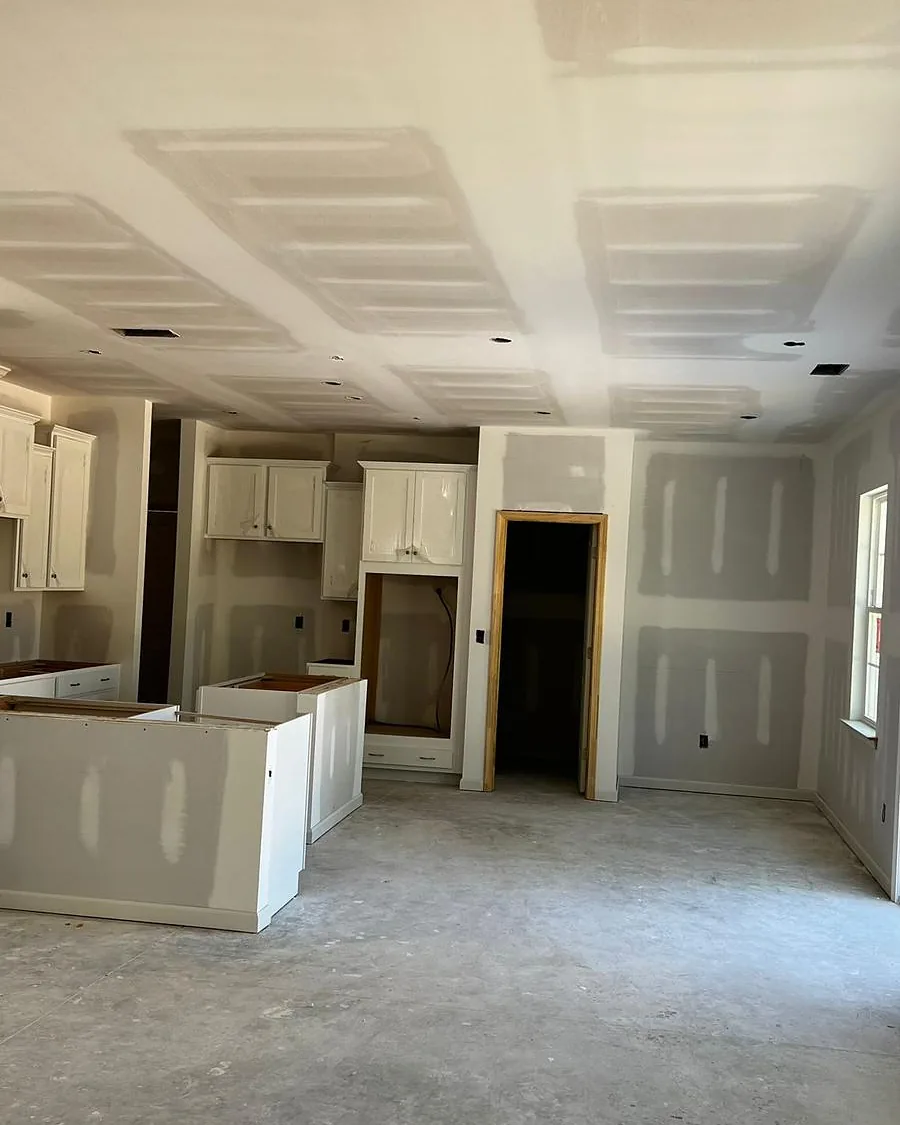 Kitchen being rebuilt with new drywall and cabinets