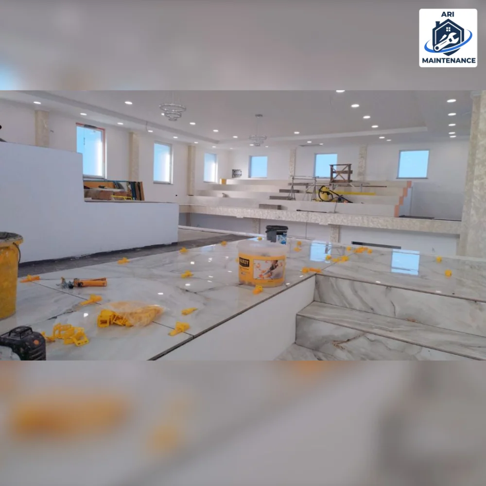 Large marble lobby being installed mid-project.