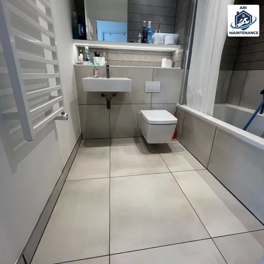 Modern grey bathroom from an alternate wide angle.
