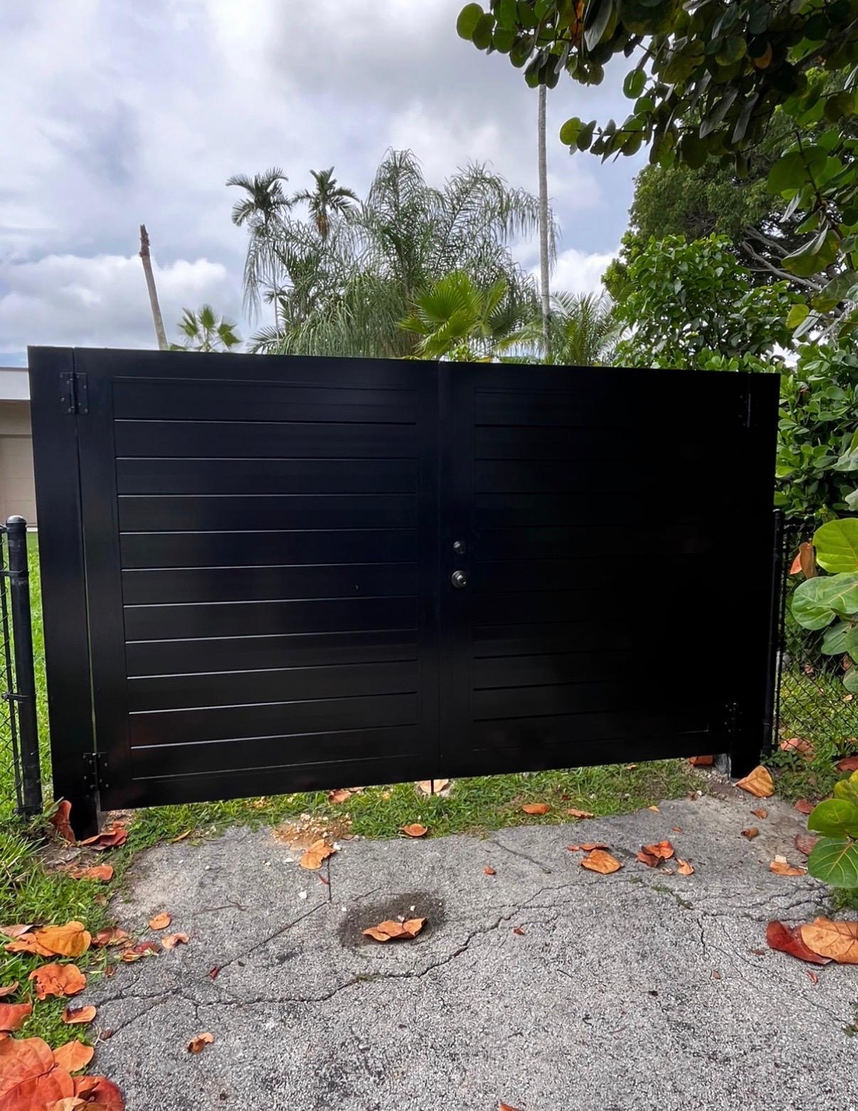 Custom metal driveway gate fabricated by Steel Power