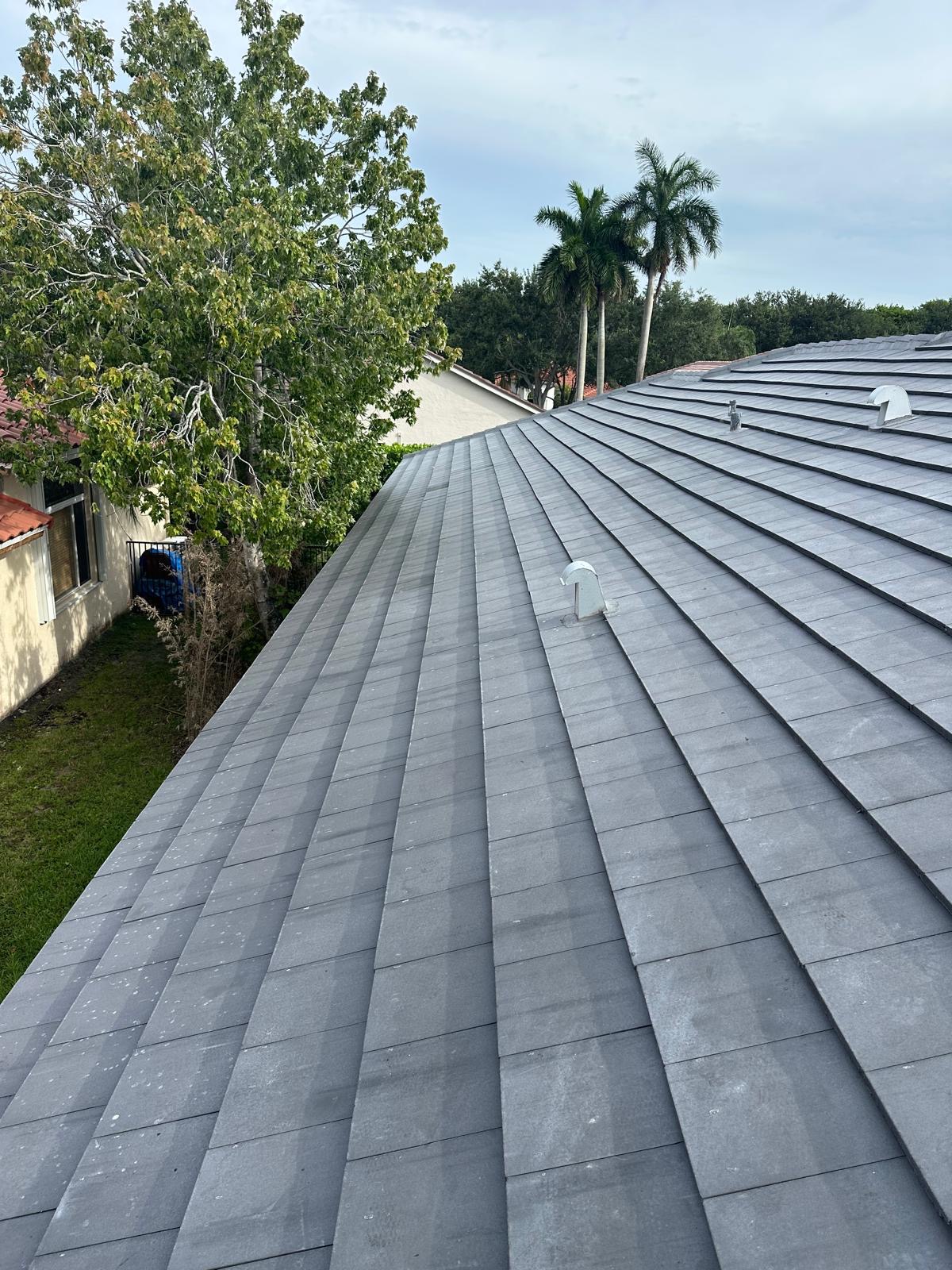 Black tile roof installed by Steel Power