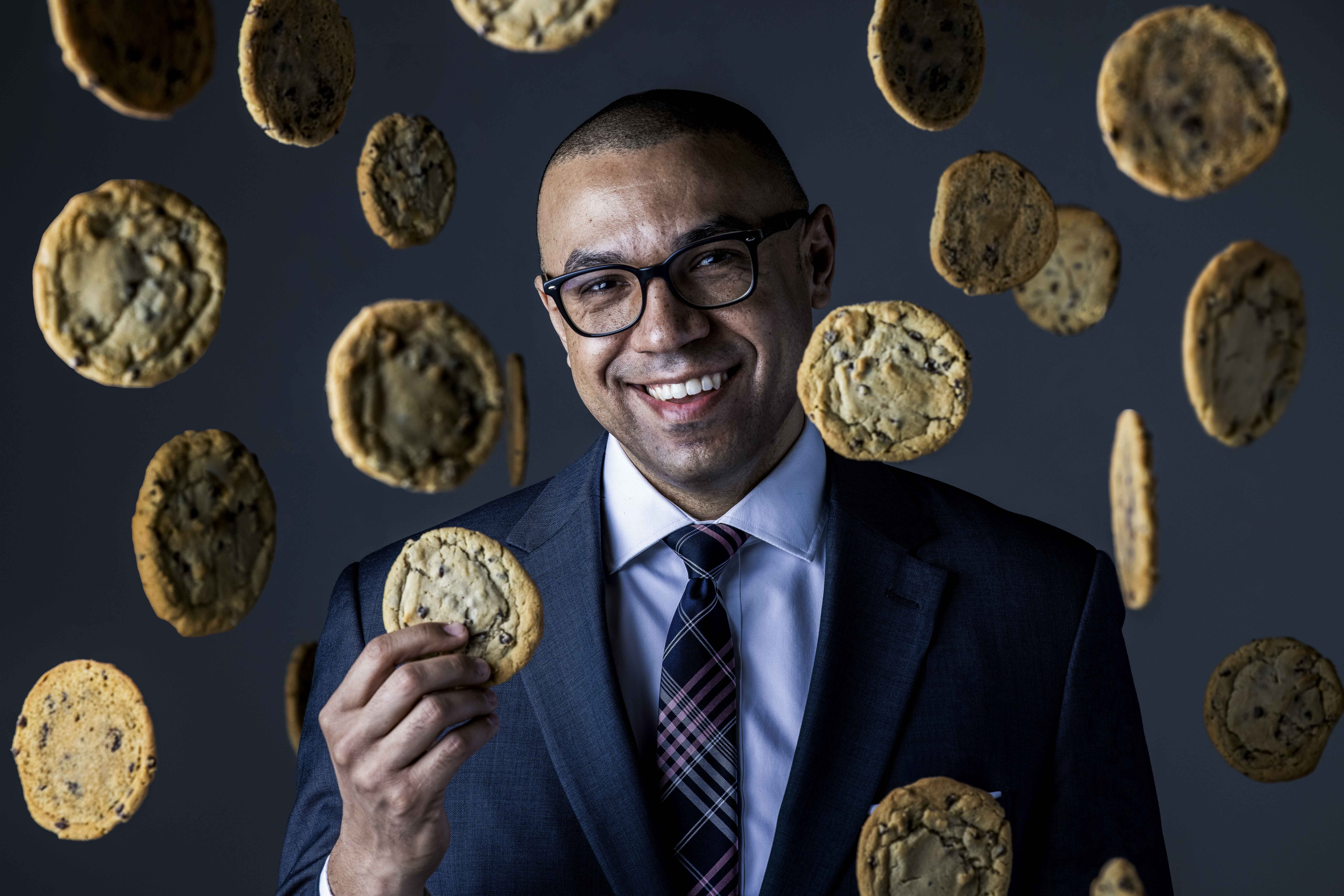 Editorial portrait with suspended cookies