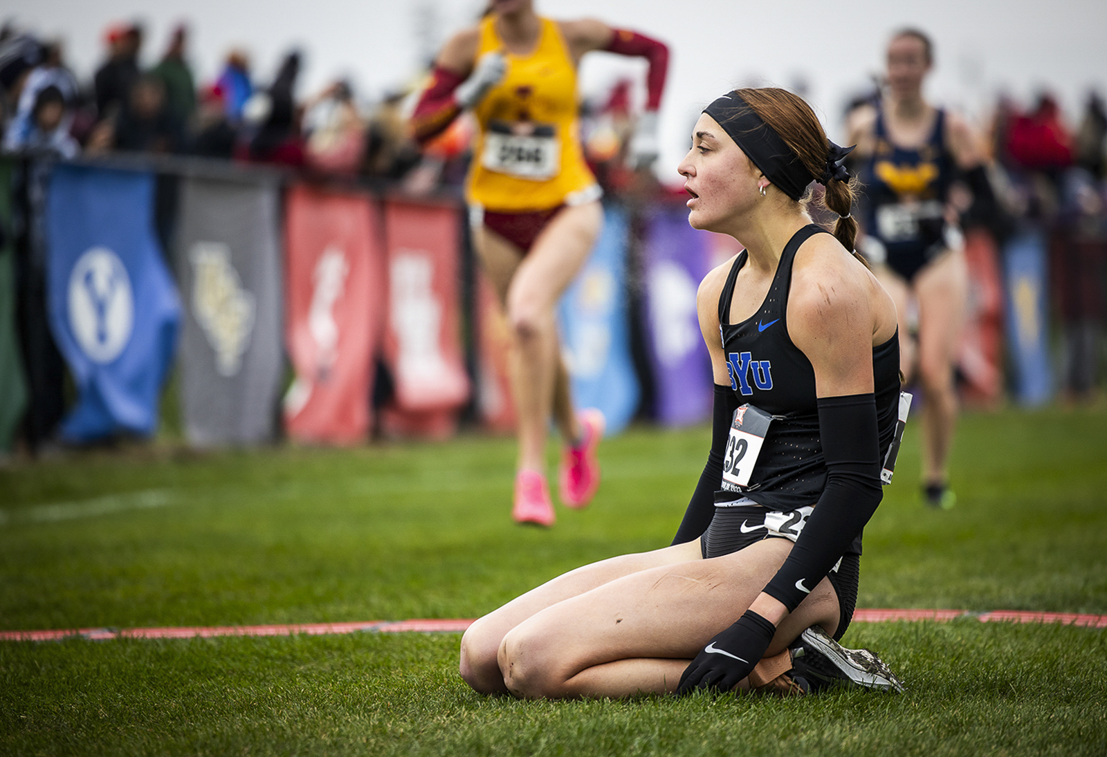 BYU cross country athlete kneeling